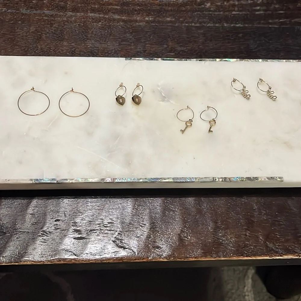 Charming Charlie gold tone four pairs of hoop Love, key and lock earrings bundle